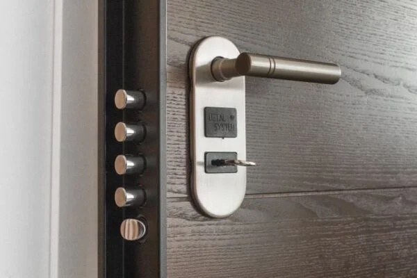 How to improve home security with better locks — secure front door with deadbolt lock